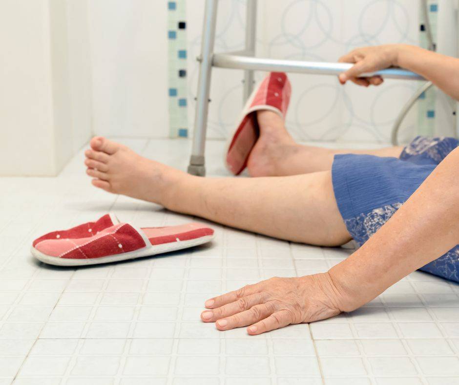 elderly person who has fallen on the bathroom floor